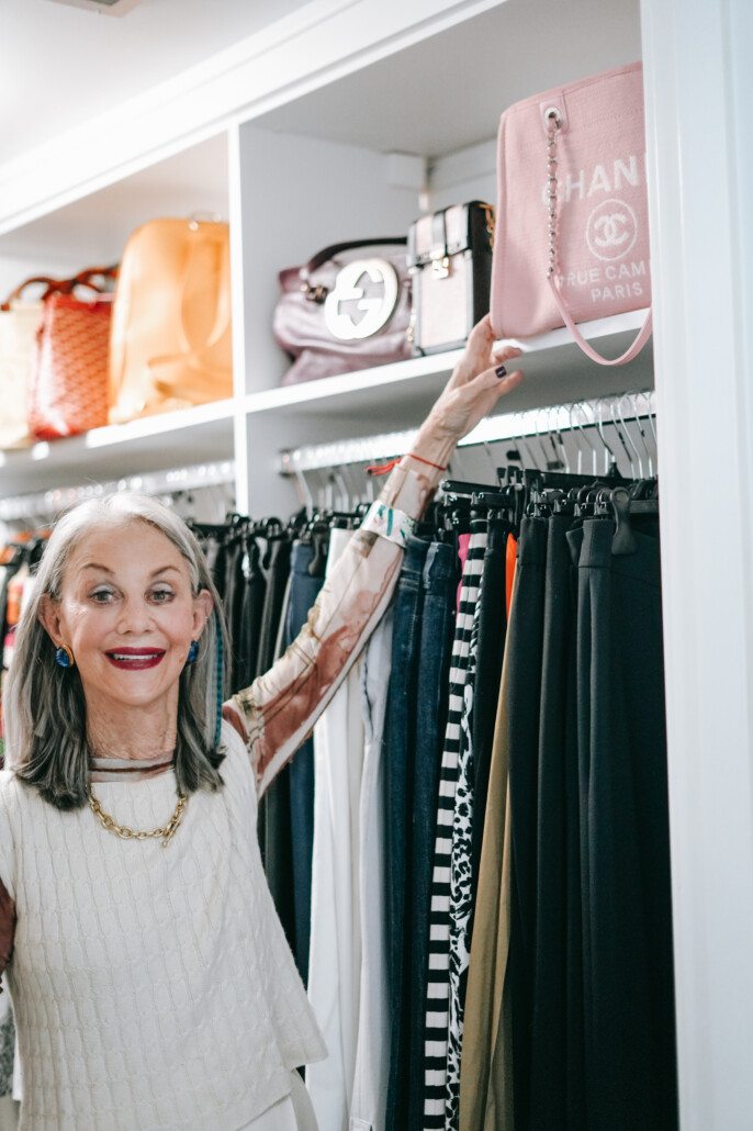 honey good in an organized closet with chanel bag