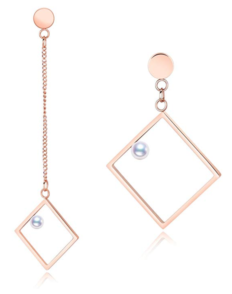 dangling rose gold earrings with a pearl