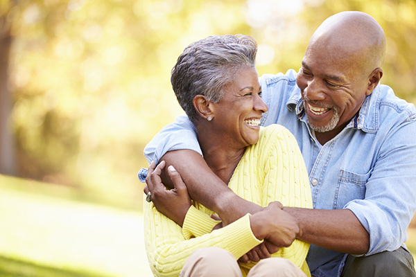 two dating seniors smiling 