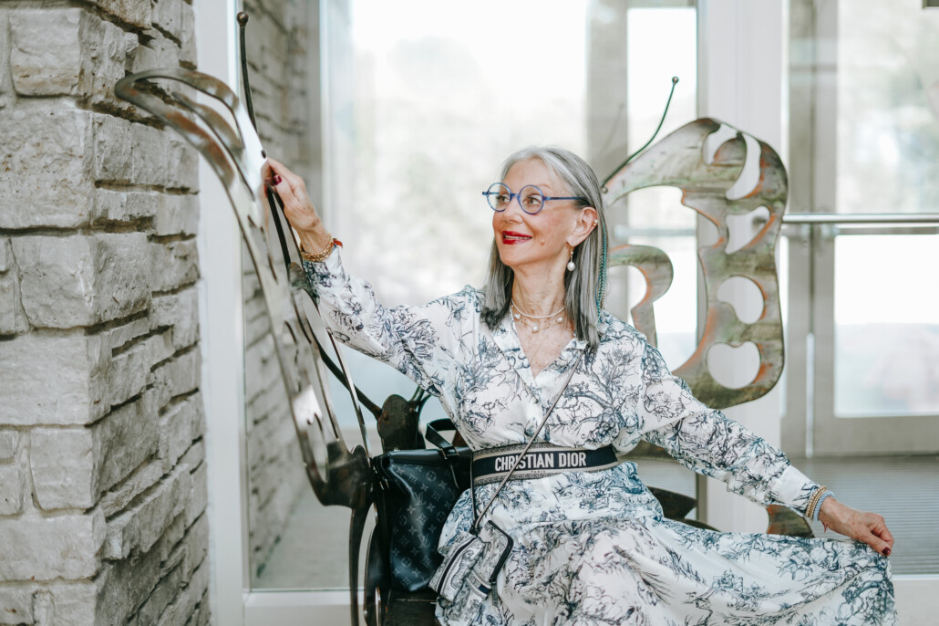 symbol of hope for Honey good image of her in a metal chair with outspread butterfly wings behind her.