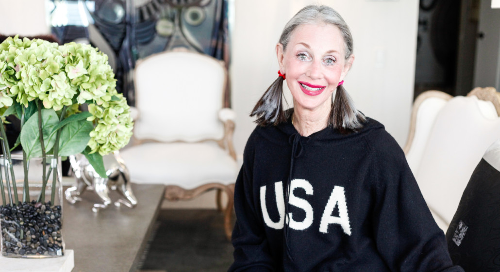 Honey dressed in USA sweater telling Jokes for the 4th of July to grandchildren