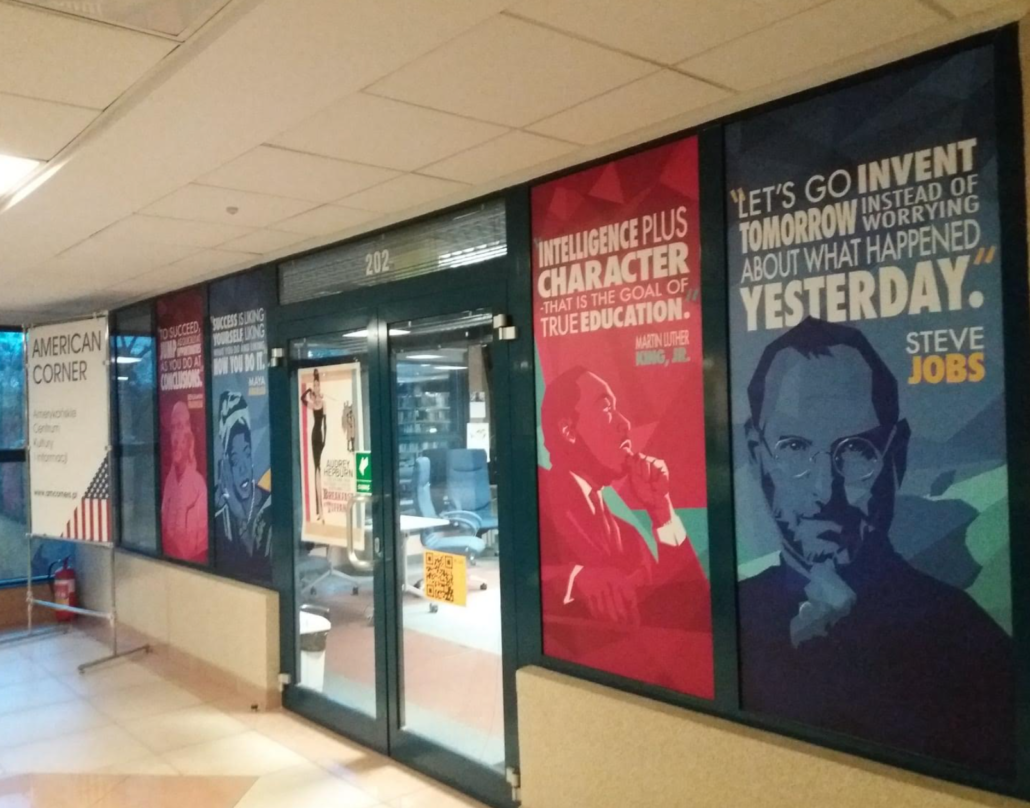 Posters along the wall at American Corner in Poland