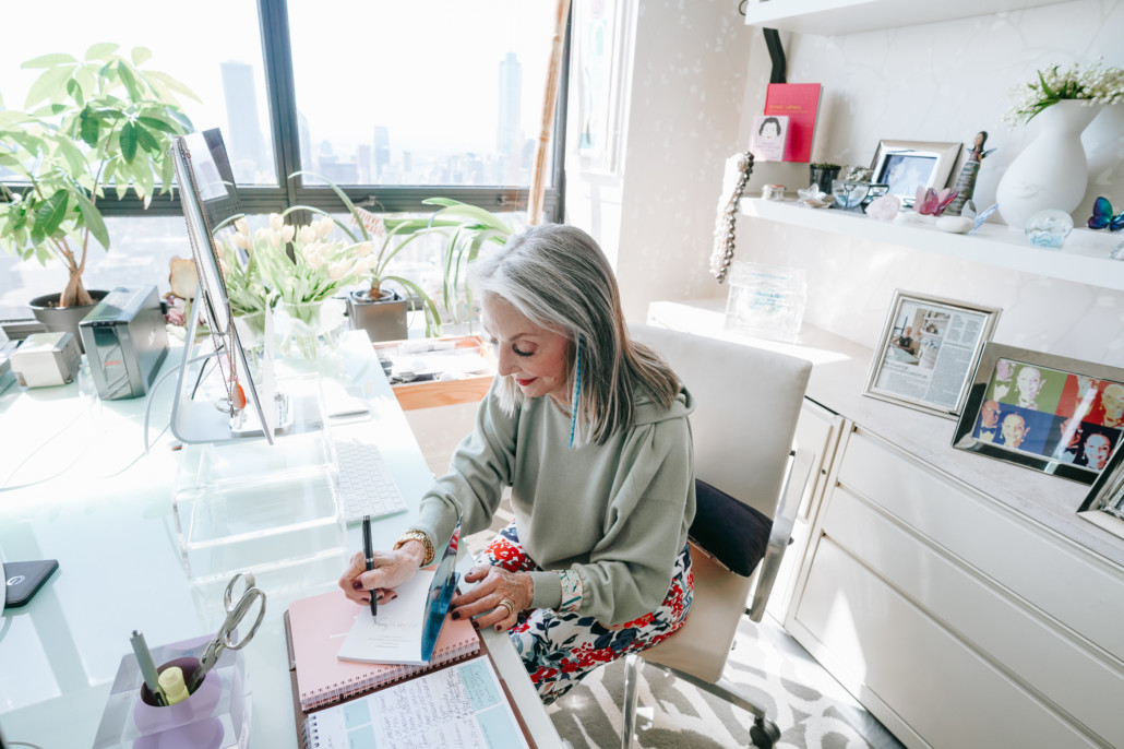 Honey Good writing at her desk