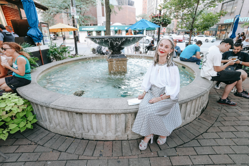 Honey Good sitting on fountain contemplating less is more