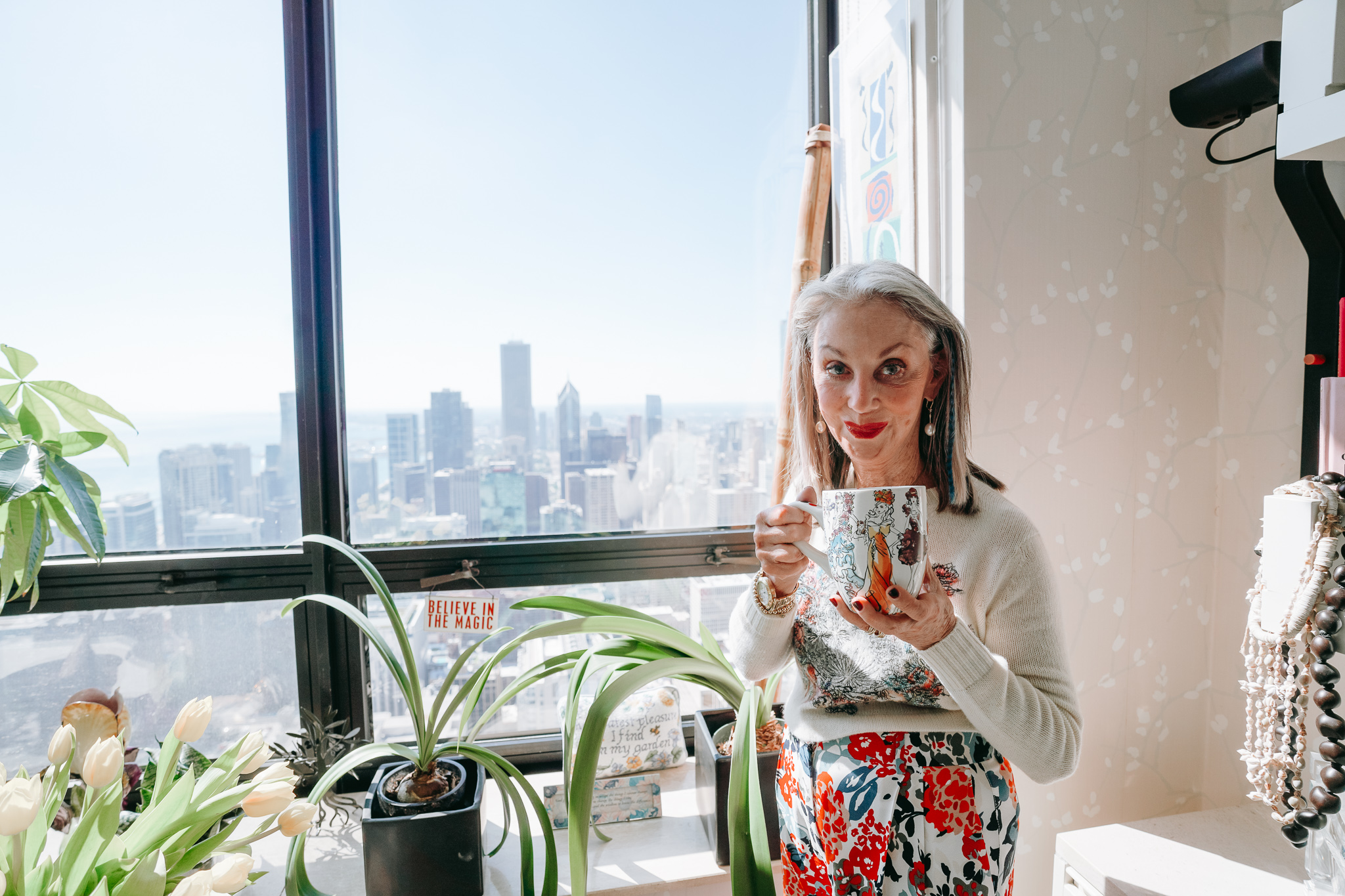 Honey Good sipping coffee contemplating her role as a caregiver to her spouse