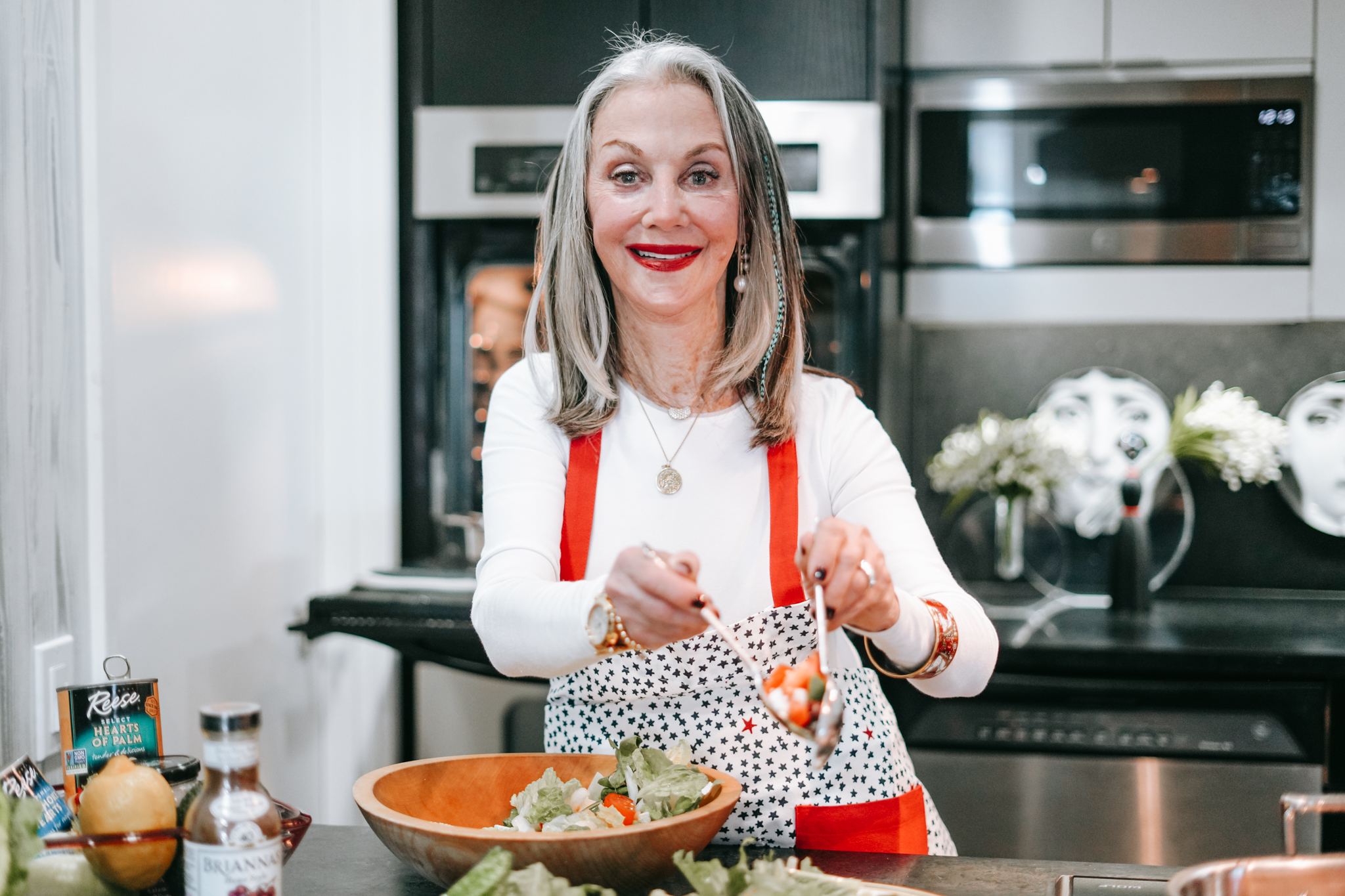 Honey good in the kitchen cooking up something for her new hobby after 50 showing how to overcome obstacles or the "pits" in the cherries of life.