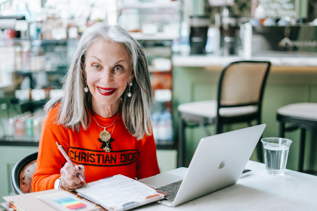 Honey Good writing in notebook to share halloween jokes with kids