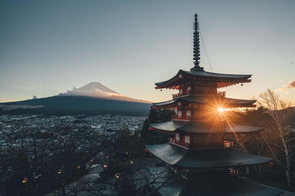 female travel after 50 pagoda temple surrounded by treesTemple, Fujisan and Sun