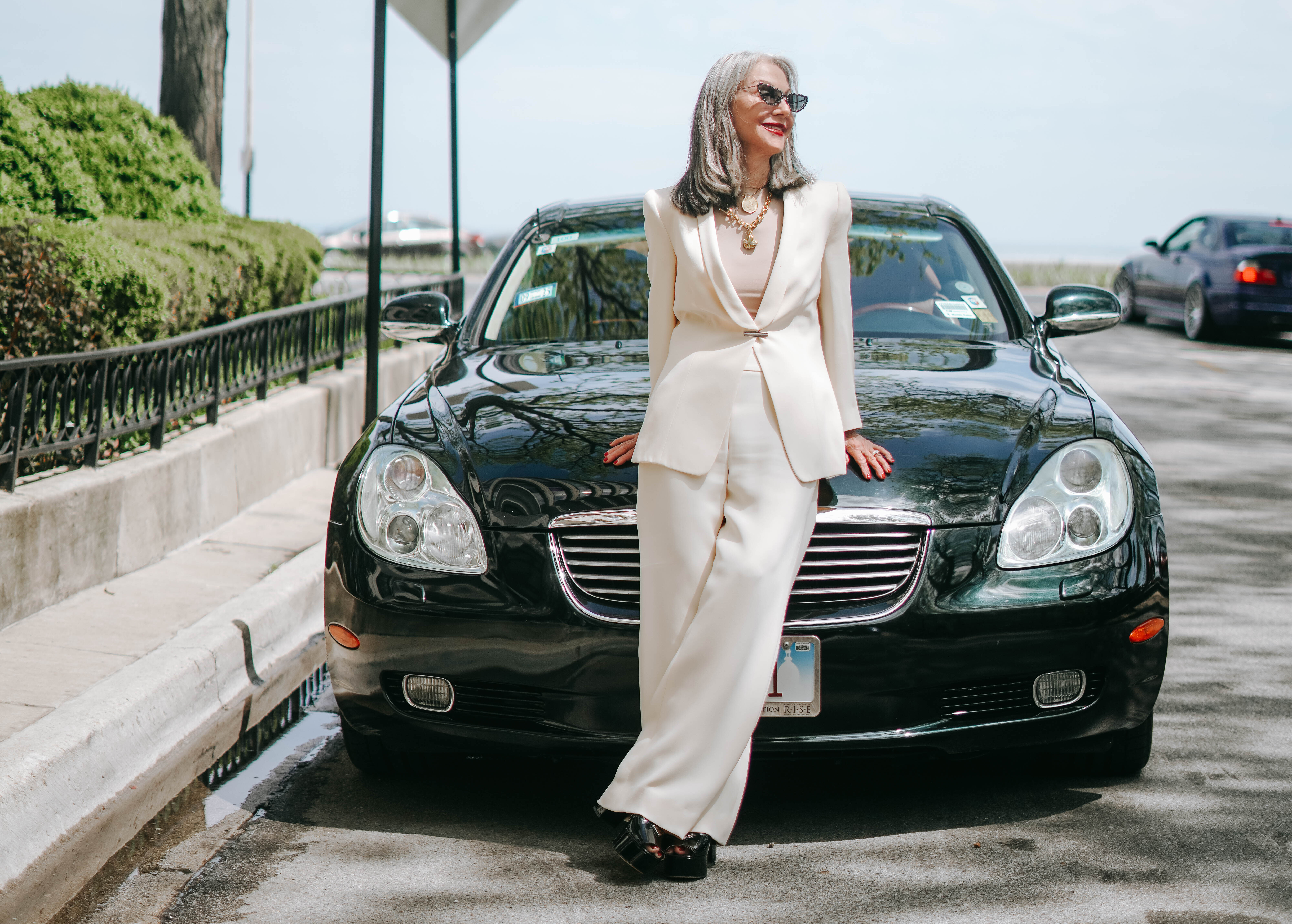 Honey Good Standing in Front of a Car feeding her soul