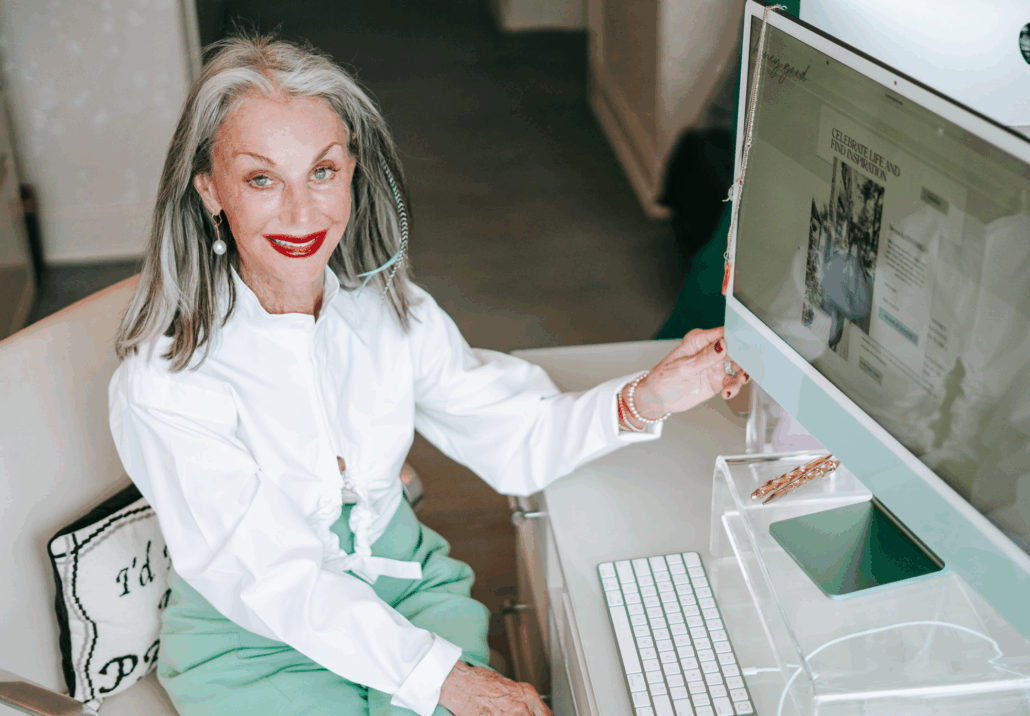 Honey smiling next to her computer