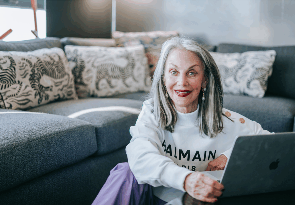 honey smiling next to a computer