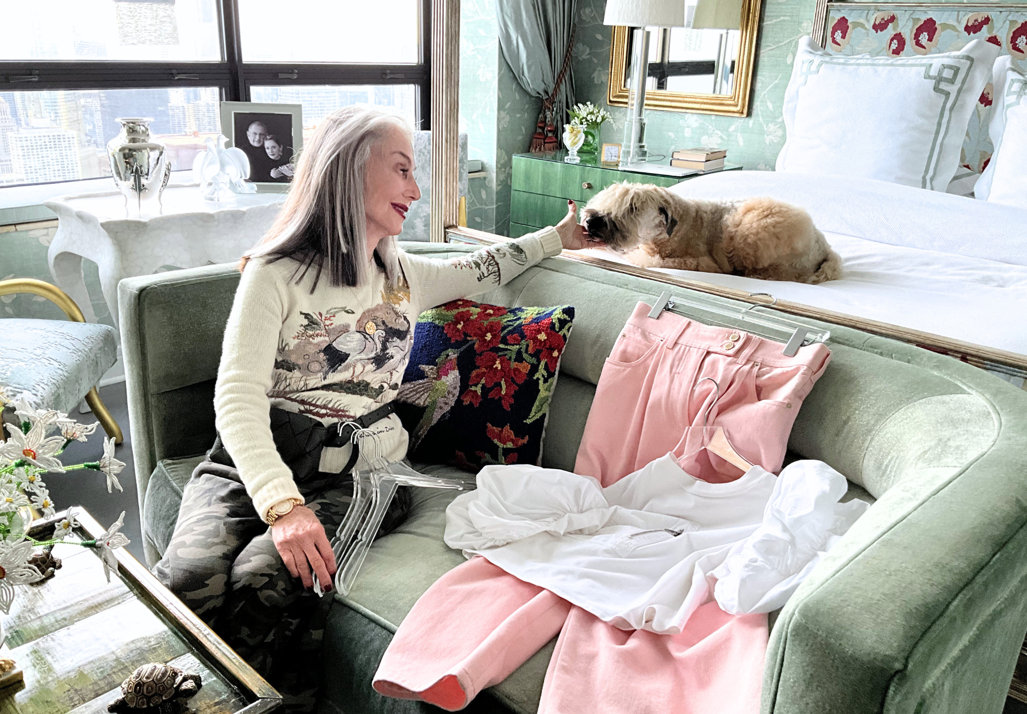 an image of Honey sitting with her pup and outfit from closet thinking about her friendships after 50